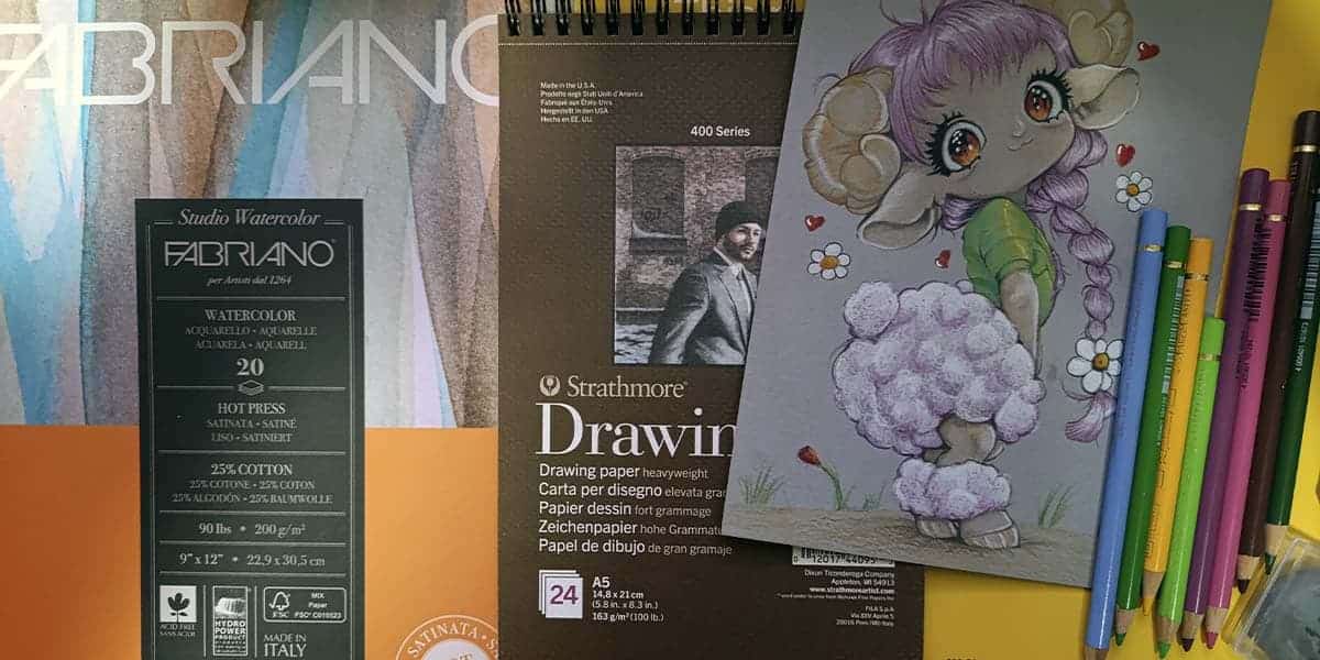 Espacio creativo de Javier Origin artista visual y educador con lápices de colores, blocs de dibujo y herramientas artísticas