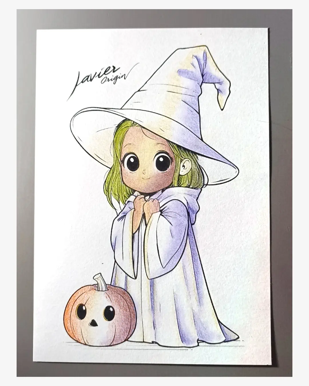 Color base en la piel, el cabello y la calabaza mientras el resto del dibujo sigue en construcción.